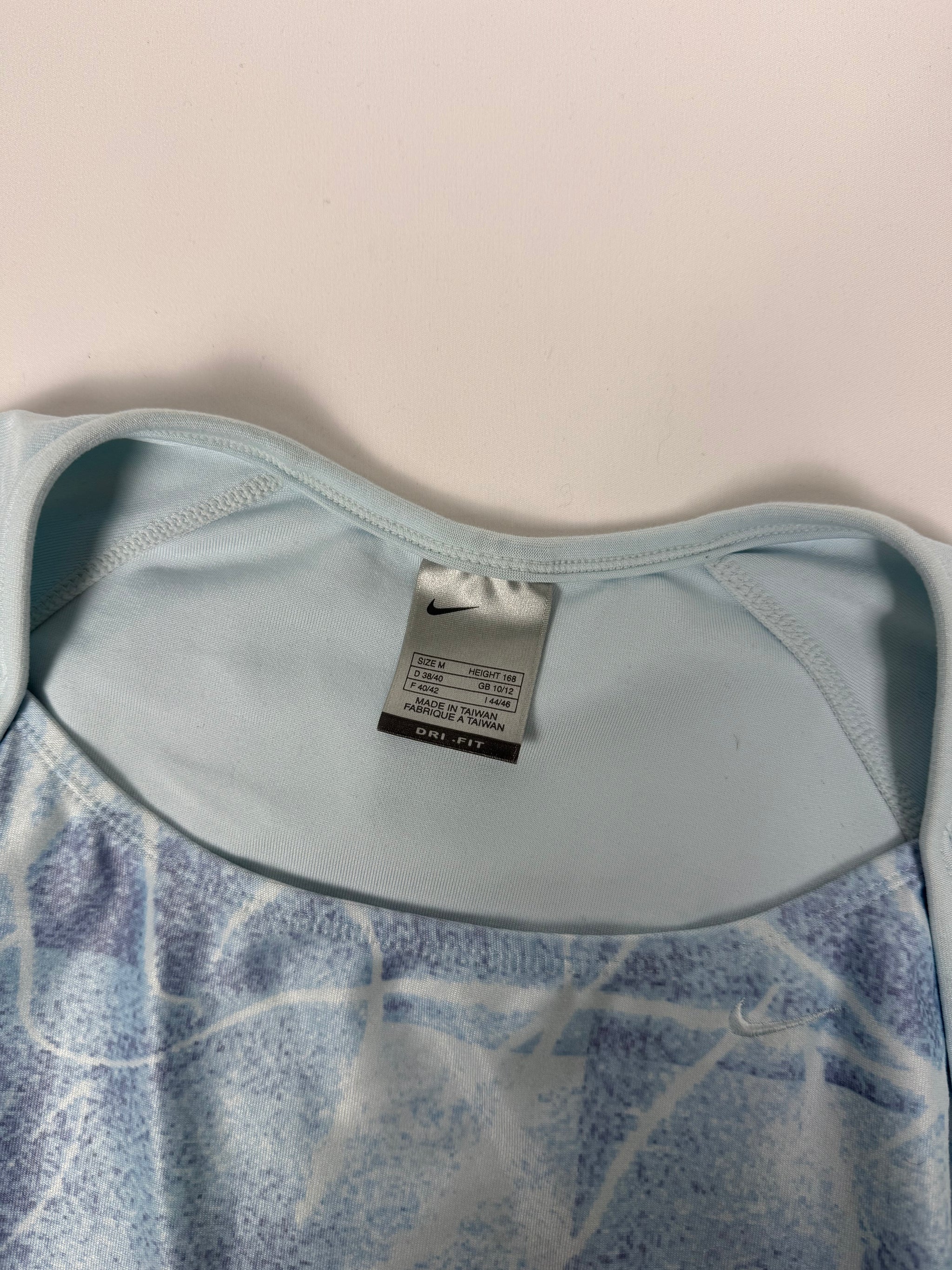 T-shirt de sport bleu ciel à logo swoosh (S/M)