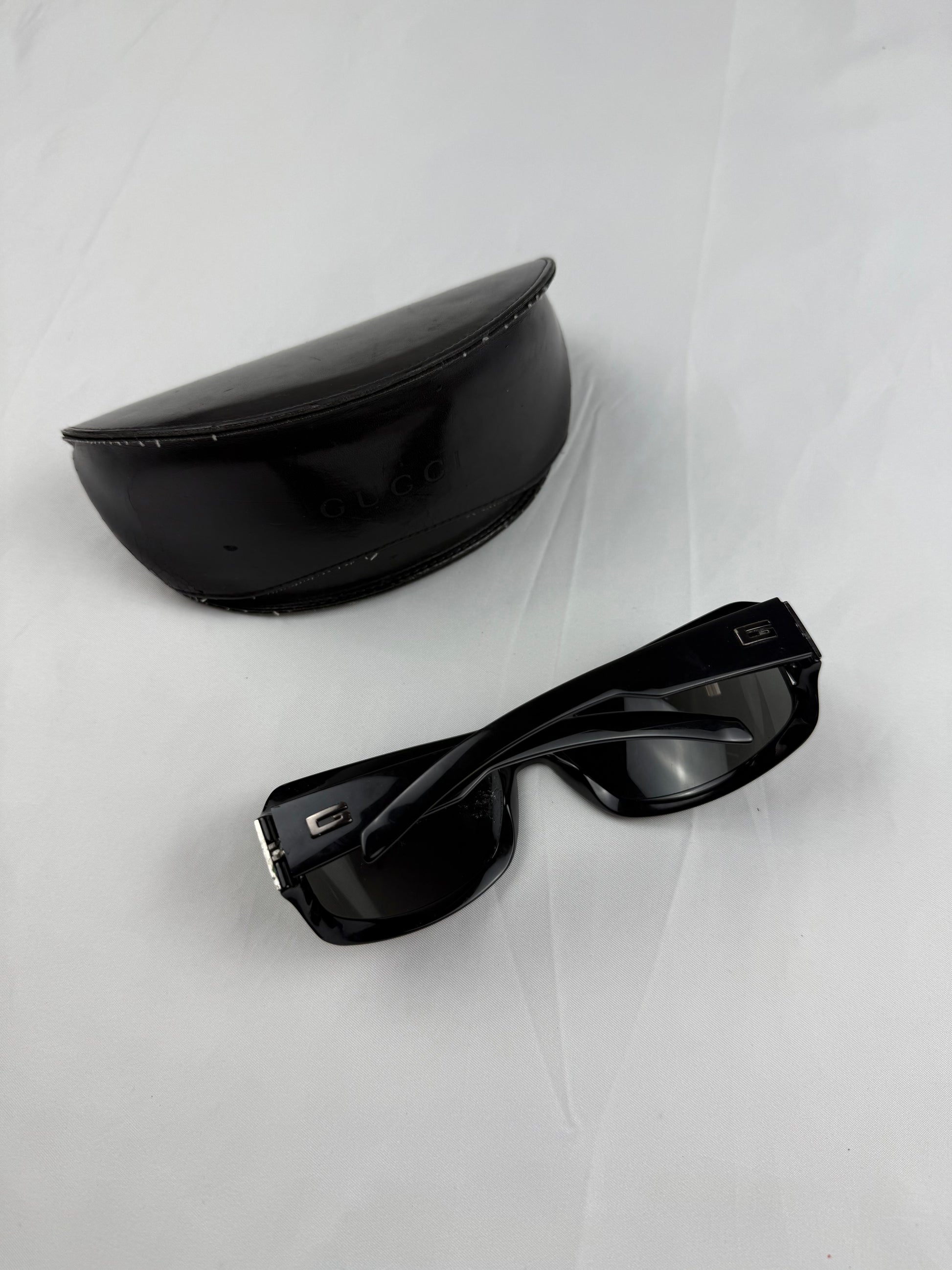 Black 2000s rhinestone logo sunglasses