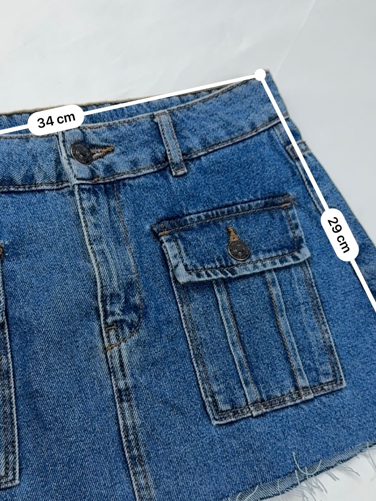 Blue denim low rise cargo mini skirt (XS)