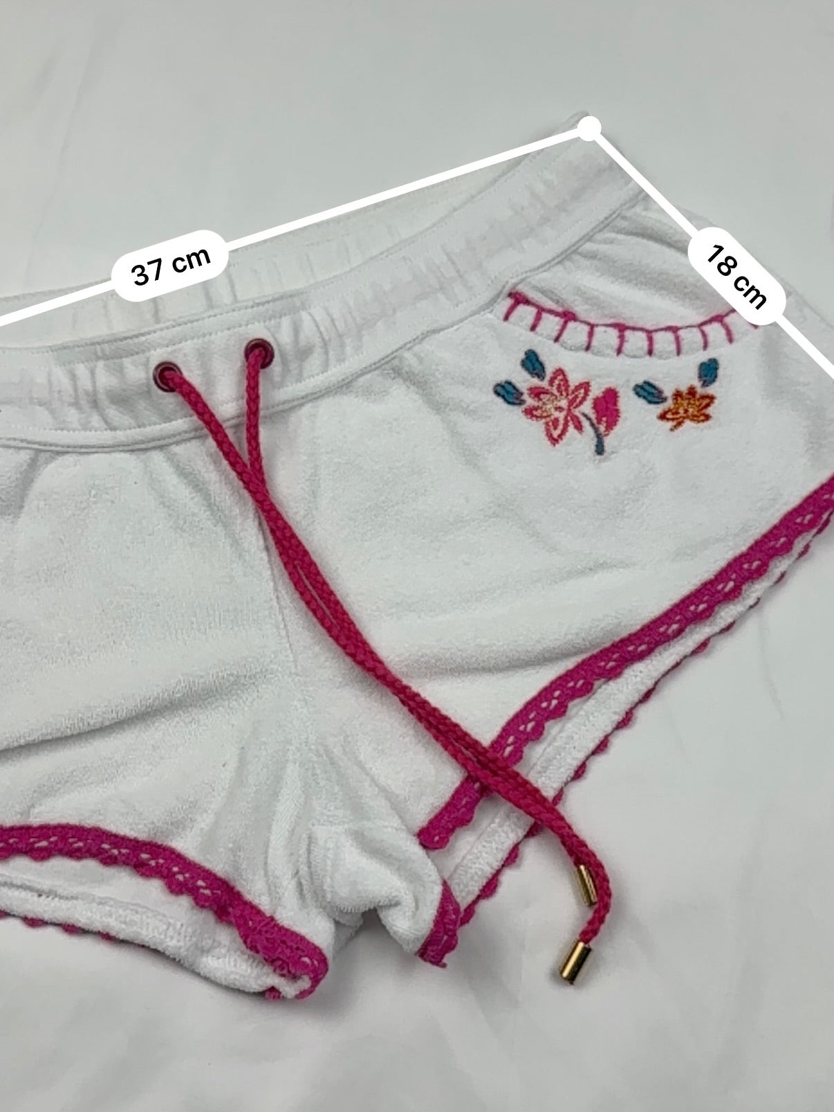 White embroidered low rise mini short (S/M)