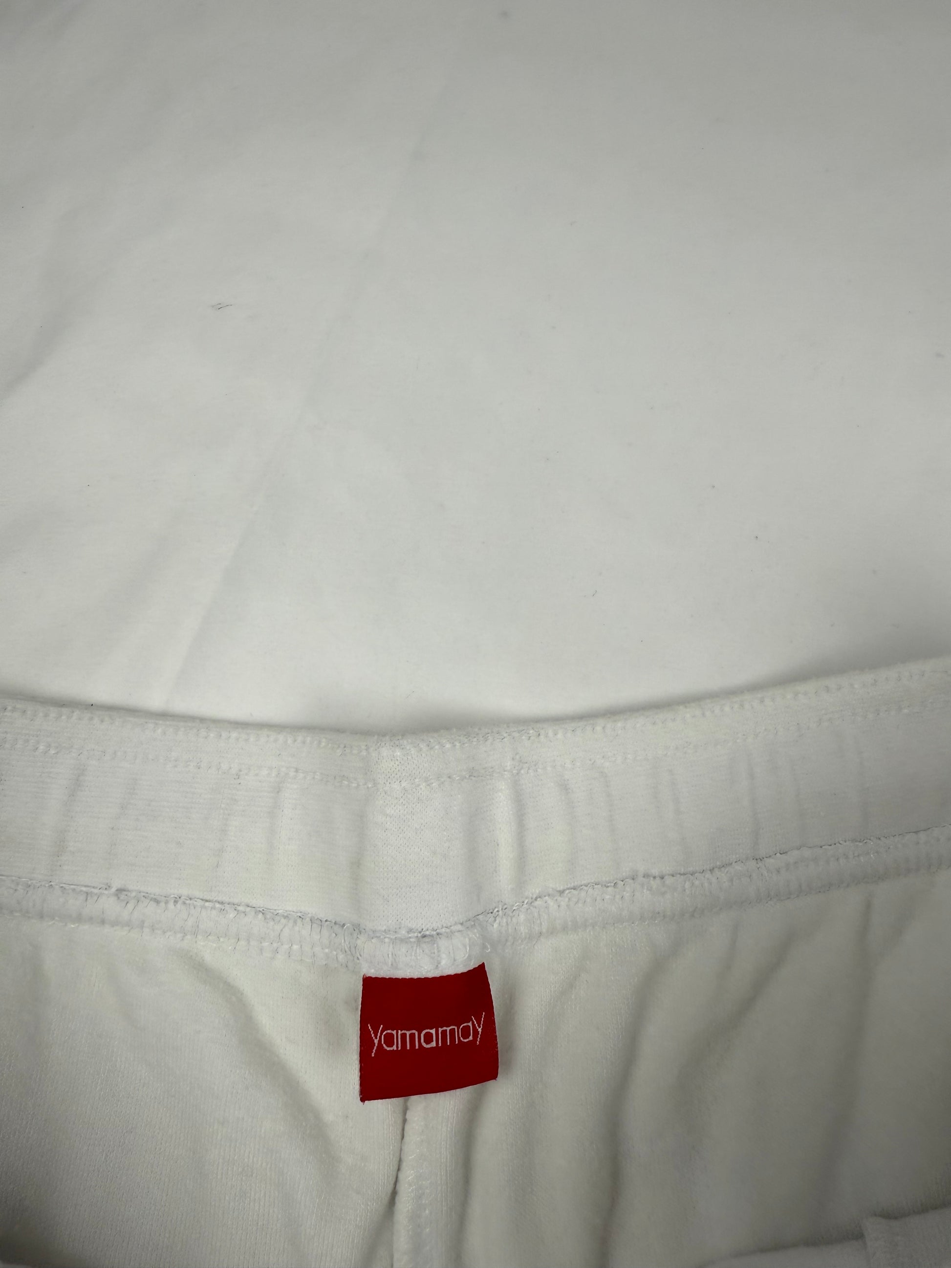 White embroidered low rise mini short (S/M)