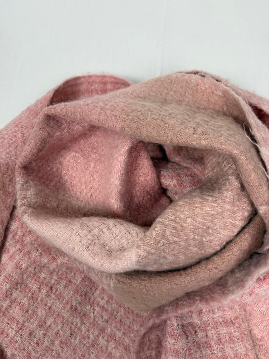 Pink knitted winter scarf