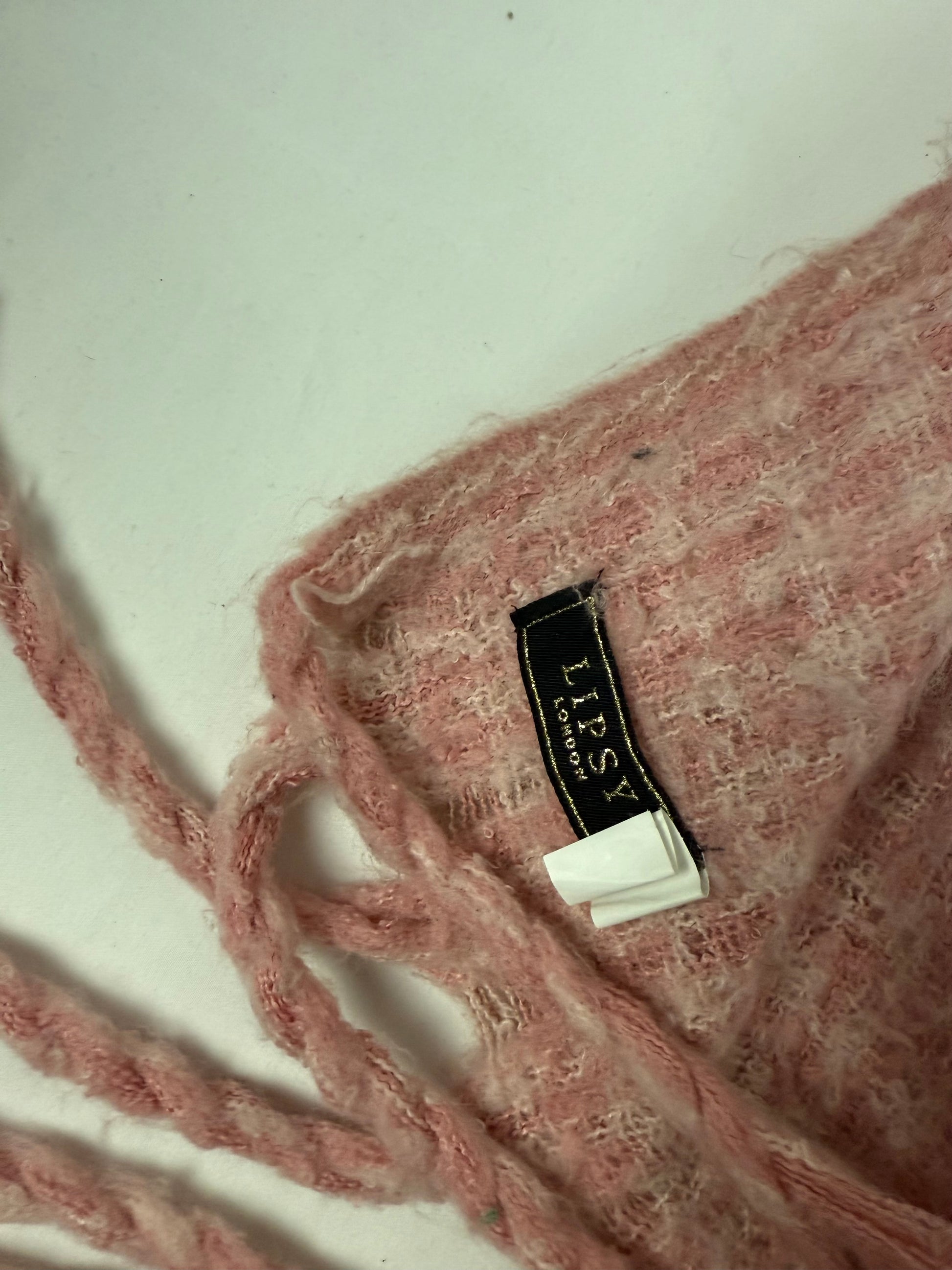 Pink knitted winter scarf