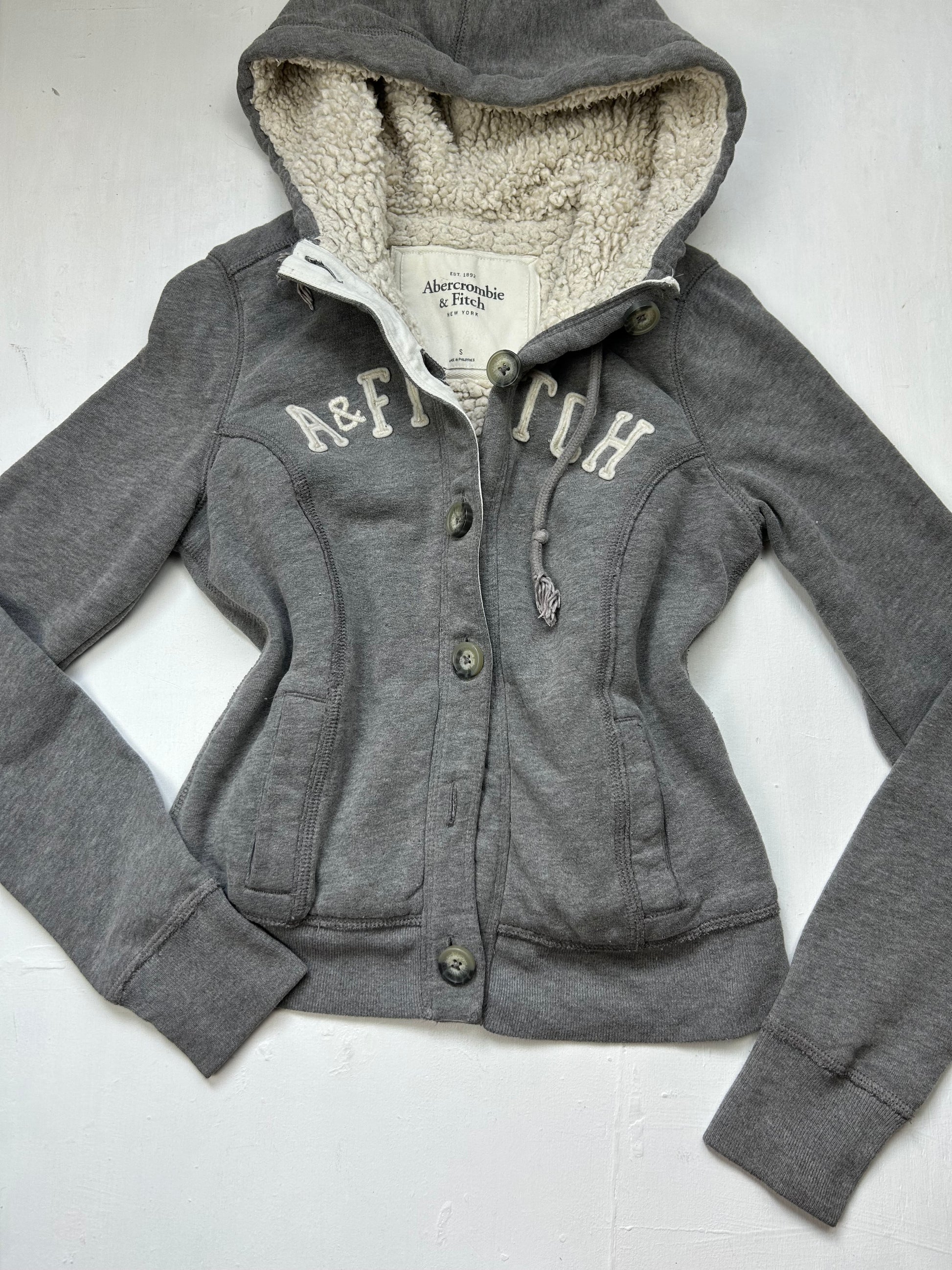 Grey spell out logo inside fleece hoodie jacket (S/M)