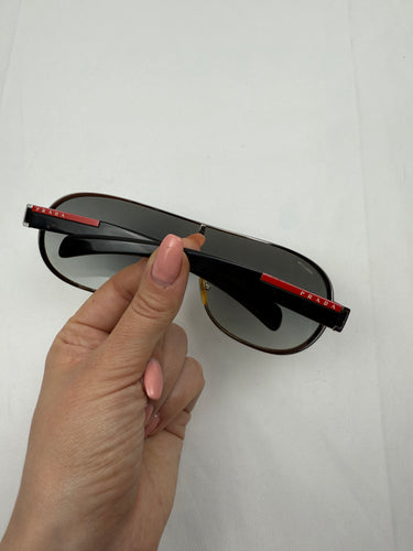 Black 2000s shield logo sunglasses