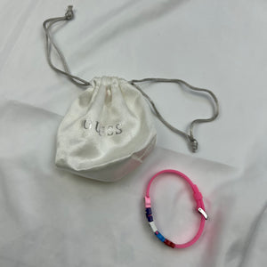 Flashy pink spell out logo pvc bracelet