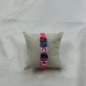 Flashy pink spell out logo pvc bracelet