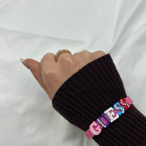 Flashy pink spell out logo pvc bracelet