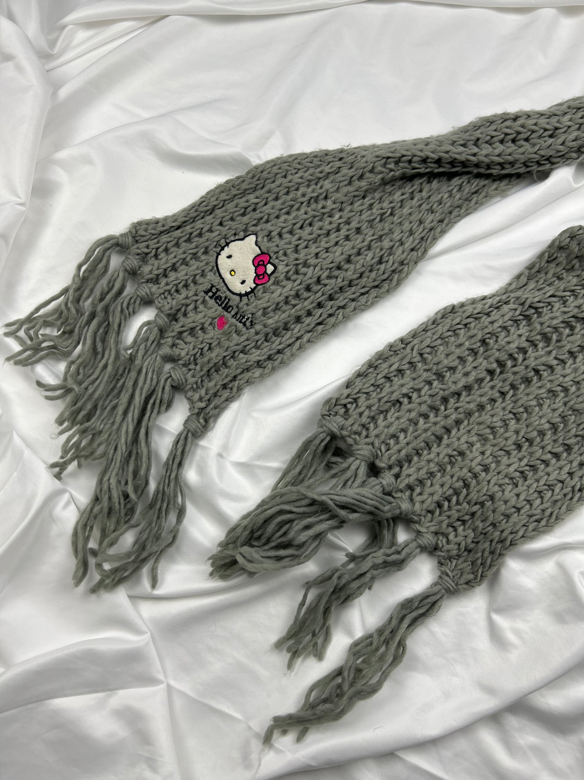 Grey knitted scarf