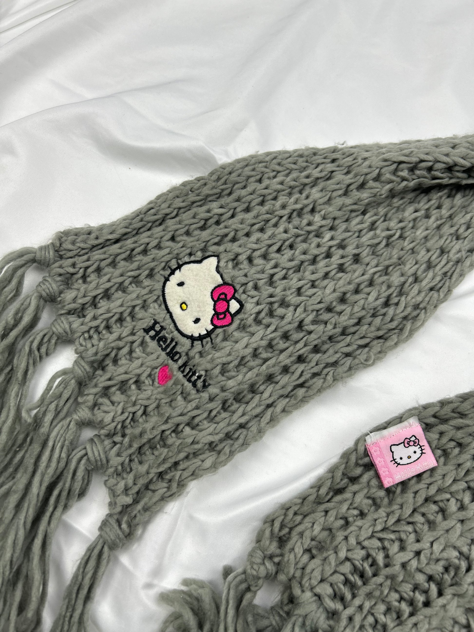 Grey knitted scarf
