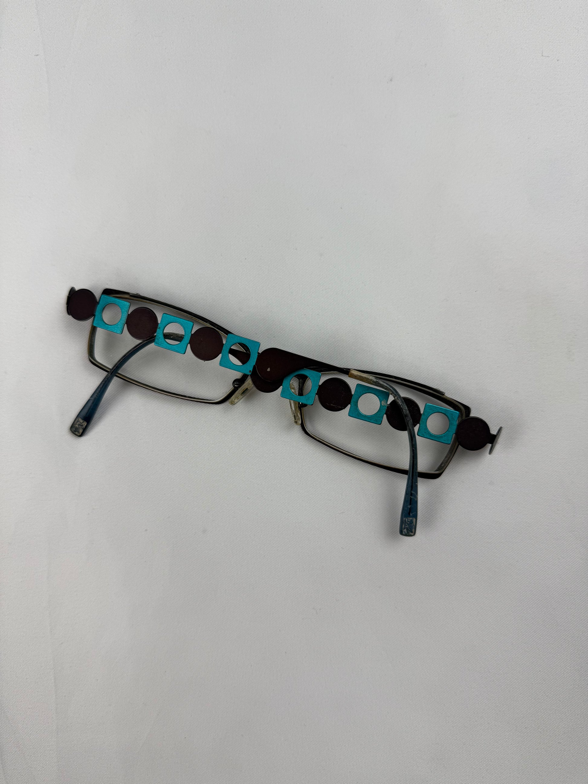 2000s office siren glasses (with prescription)