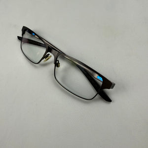 2000s office siren glasses (with prescription)