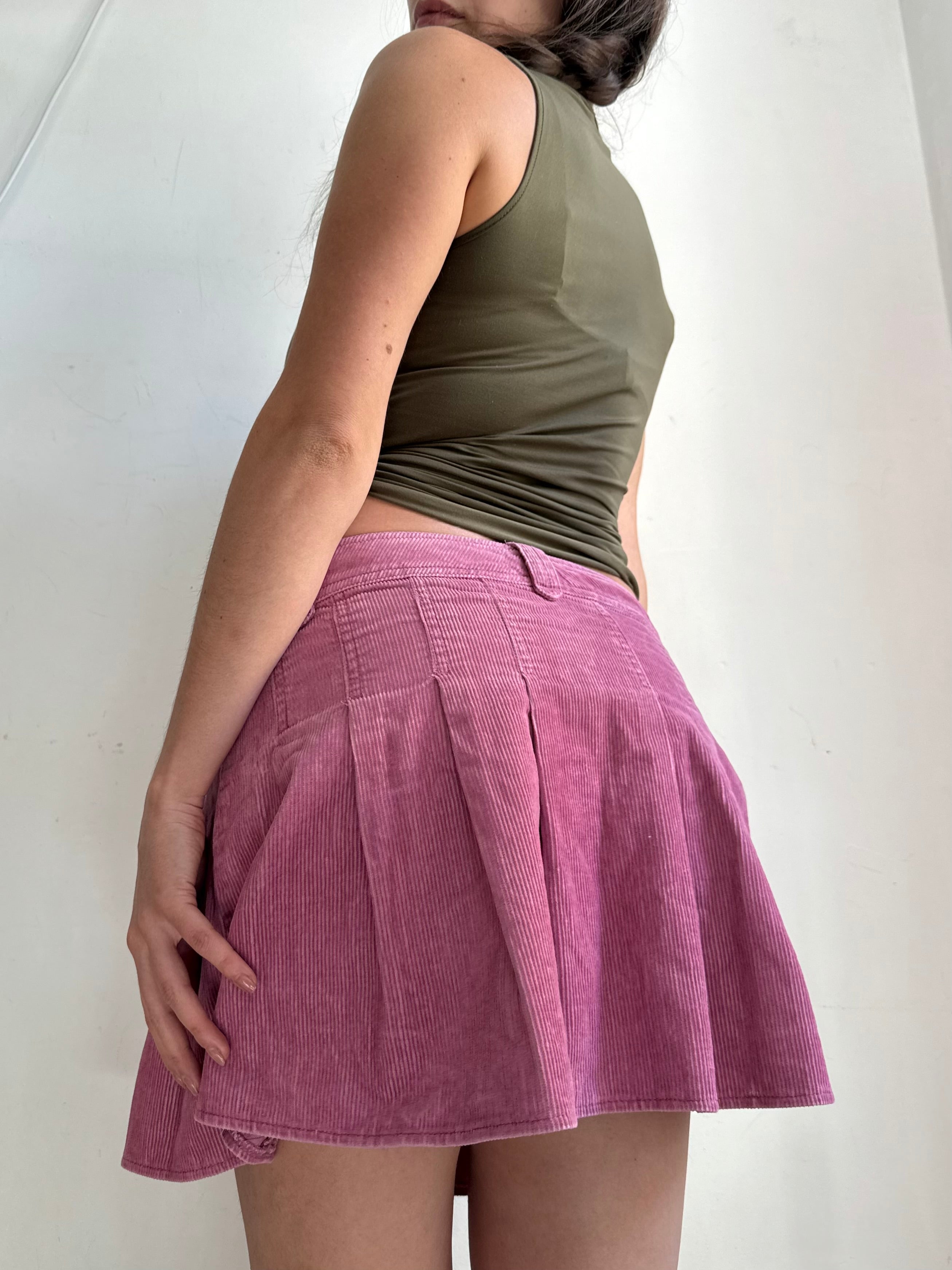 Pink ribbed denim pleated low rise mini skirt (M/L)