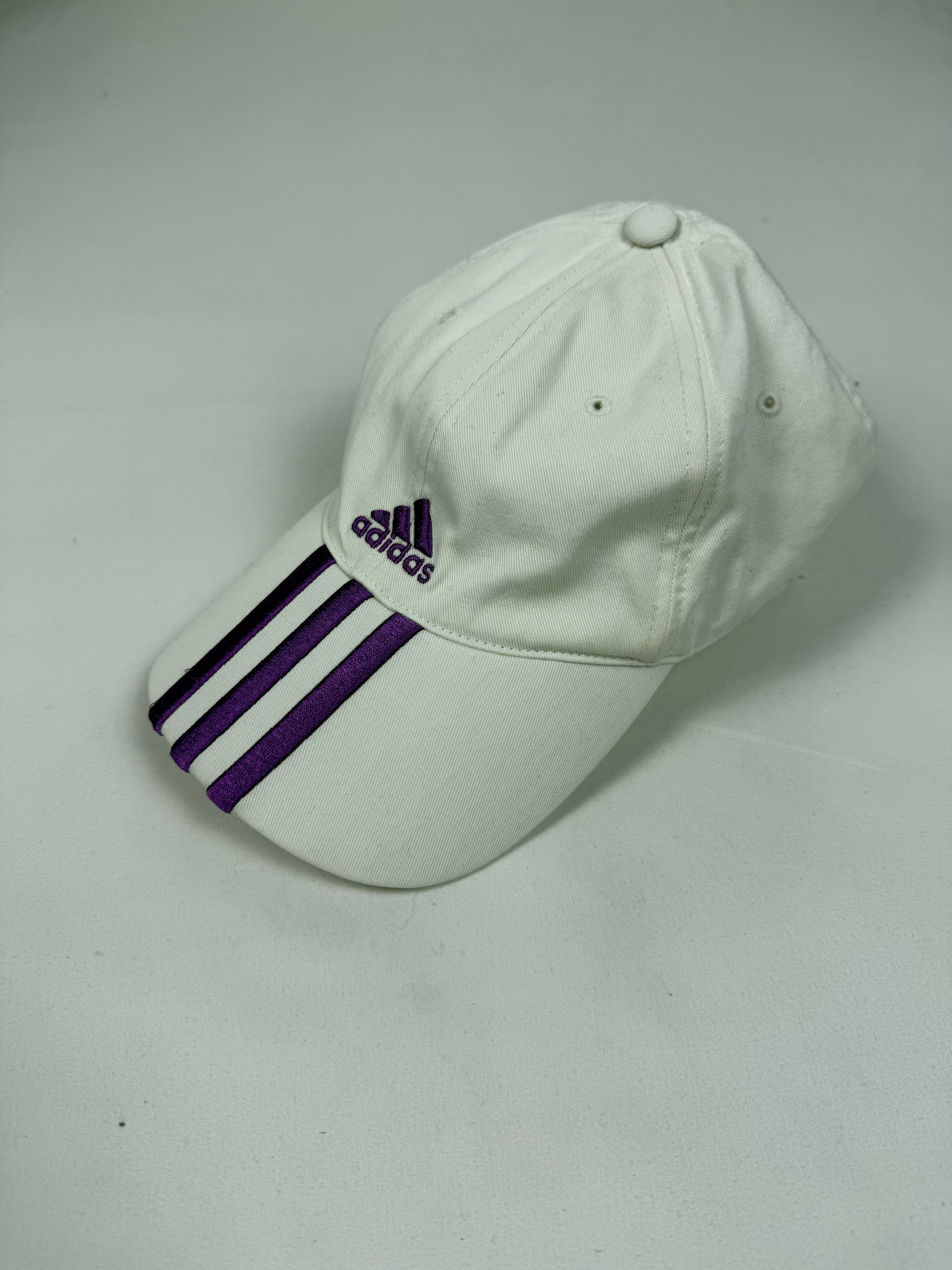 White & purple logo cap
