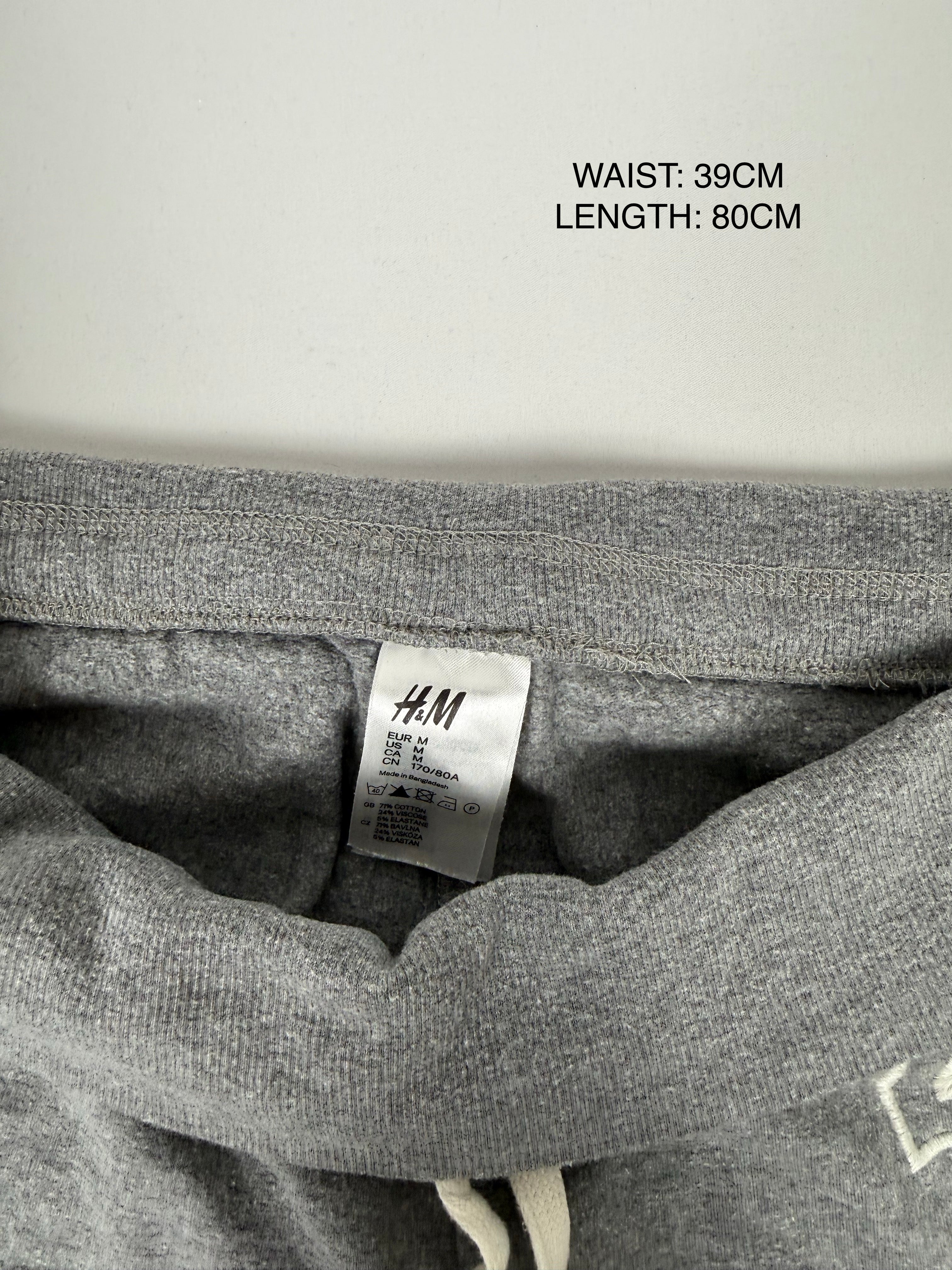 Grey ultra low rise capri pants (M)
