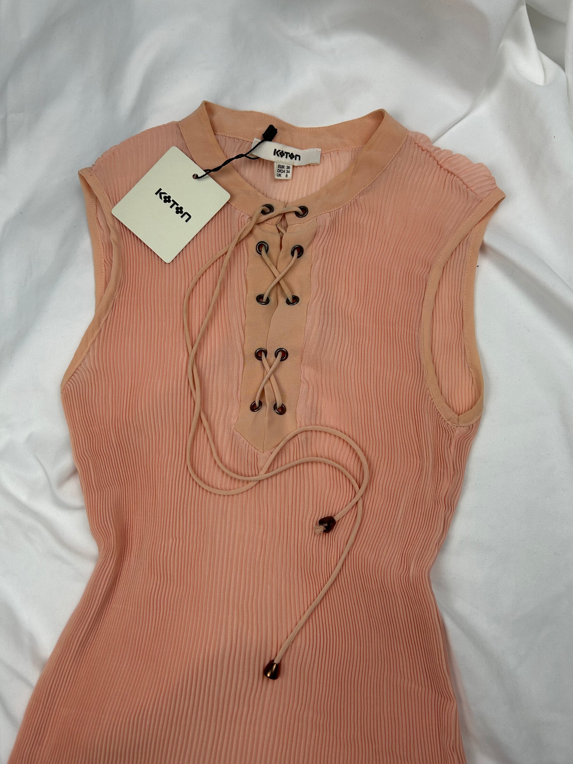 Beige / peach mesh pleated lace up tank top (M)