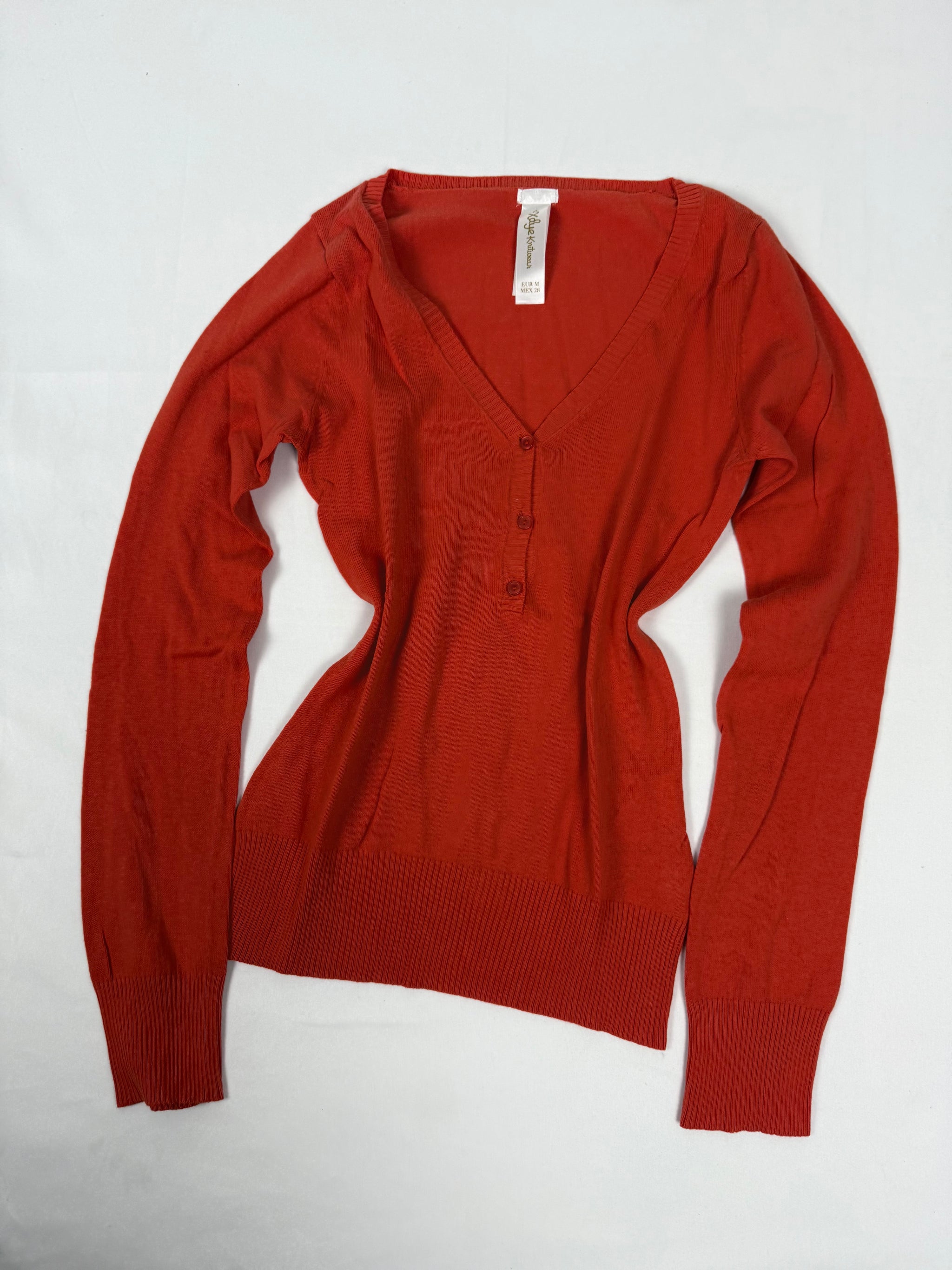 Orange ribbed tight fit jumper (M)