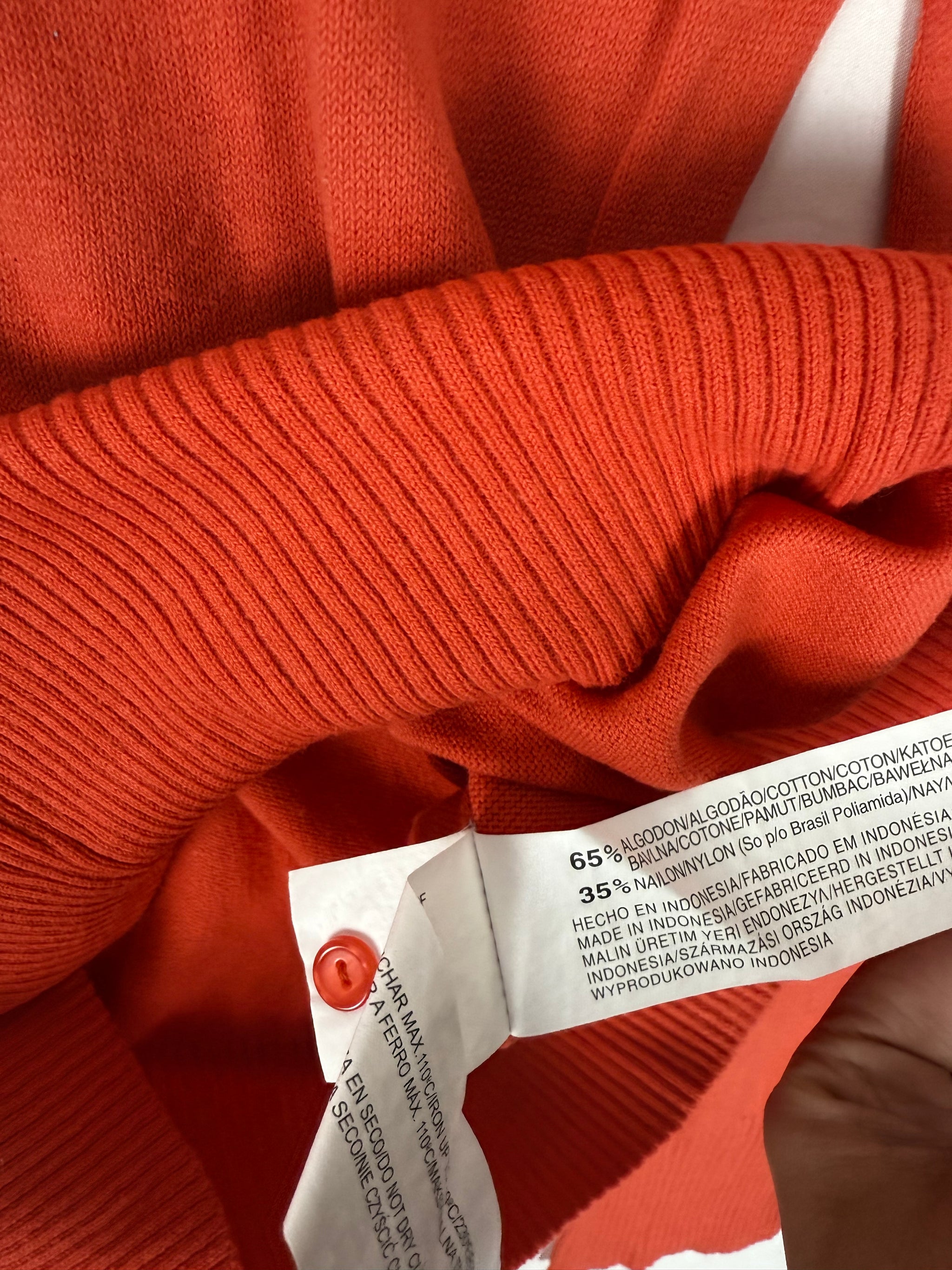 Orange ribbed tight fit jumper (M)