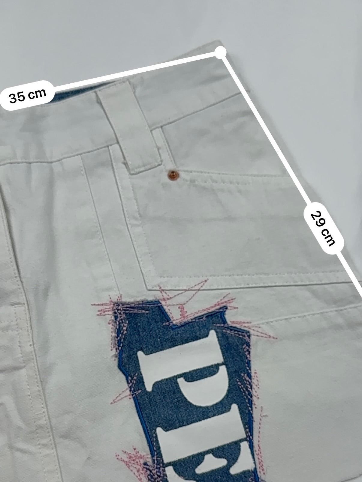 White denim low rise mini skirt (XS)