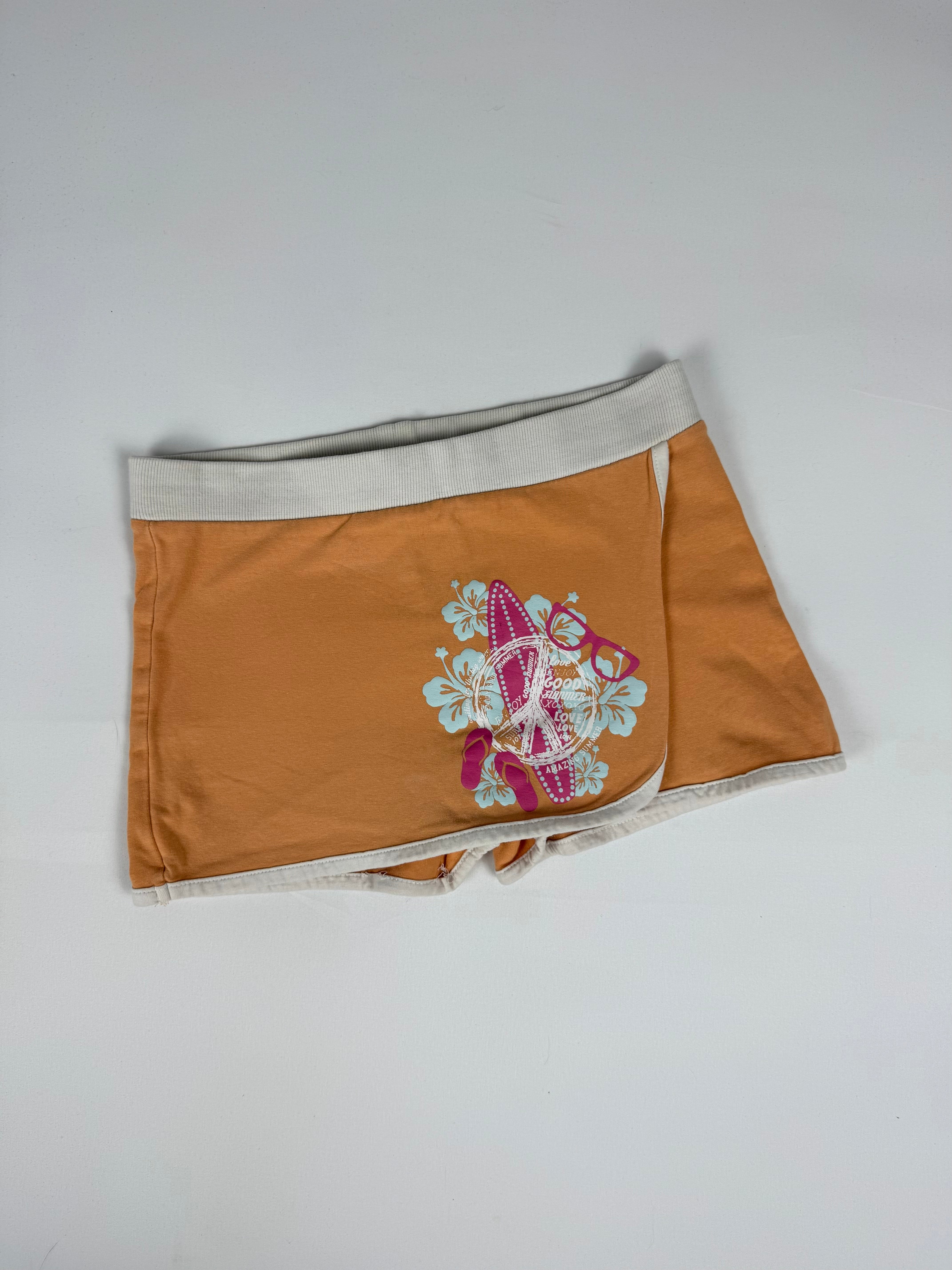 Orange graphic low rise mini skort (XS)