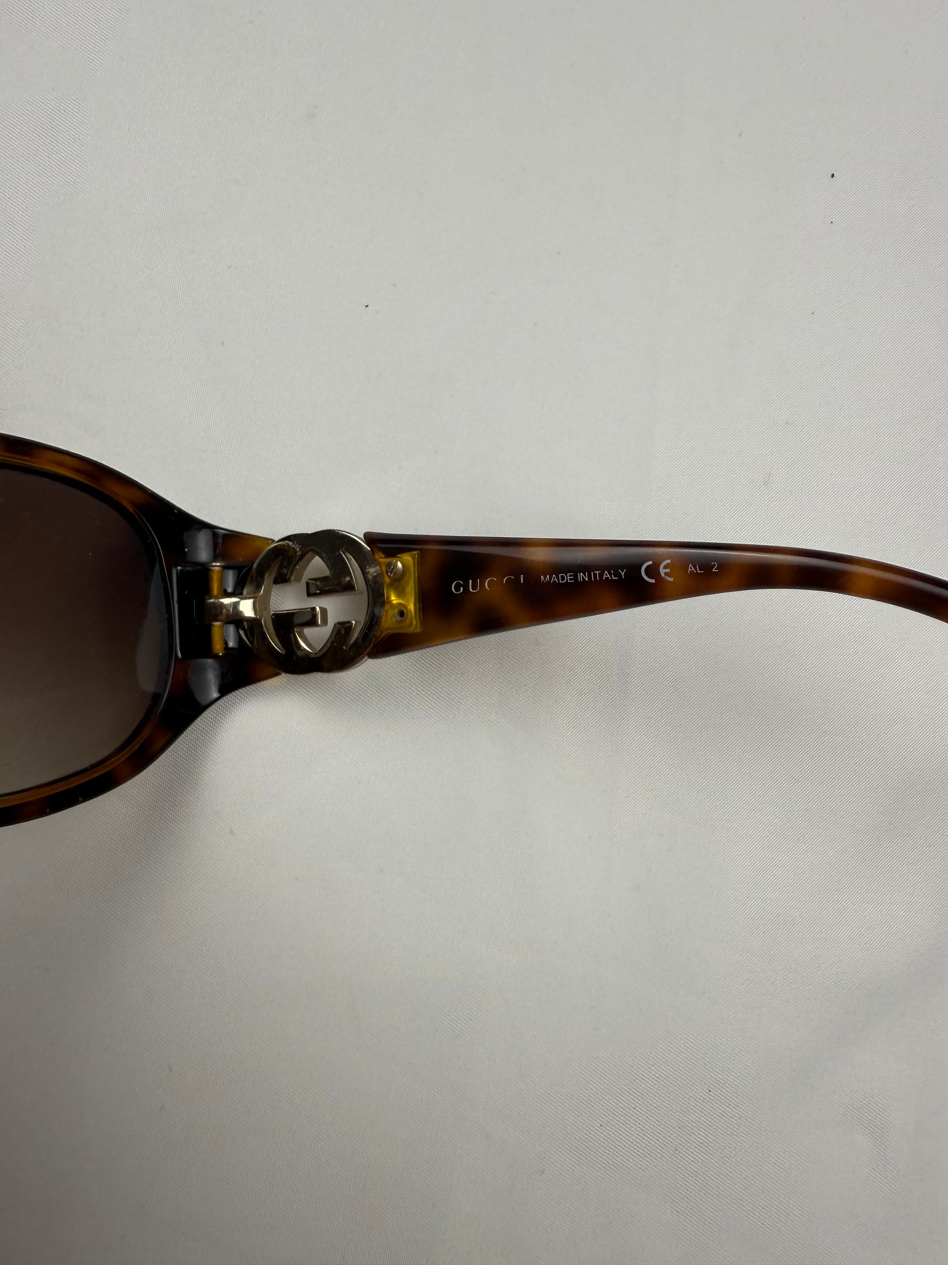 Brown 2000s gold logo sunglasses