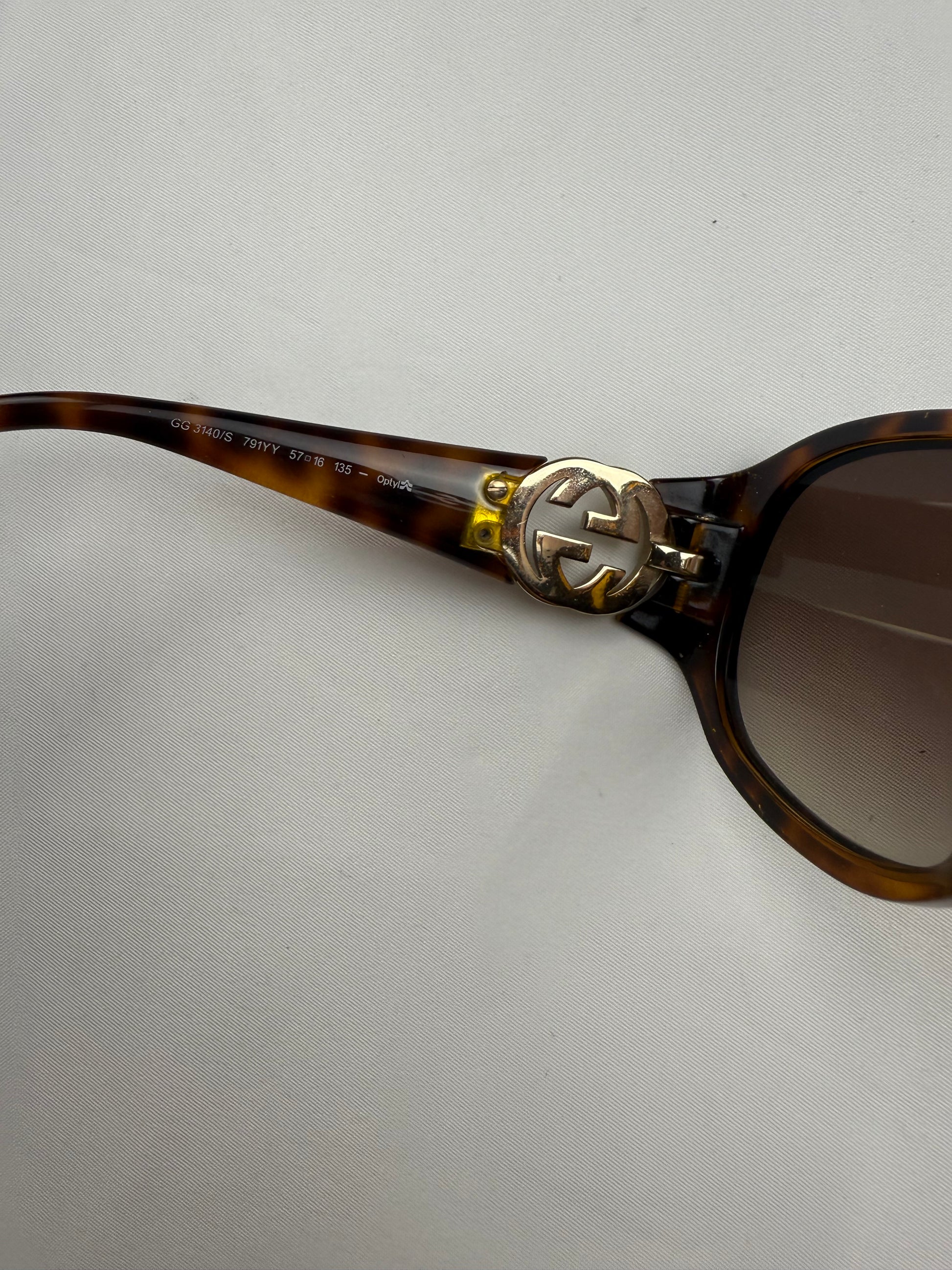 Brown 2000s gold logo sunglasses