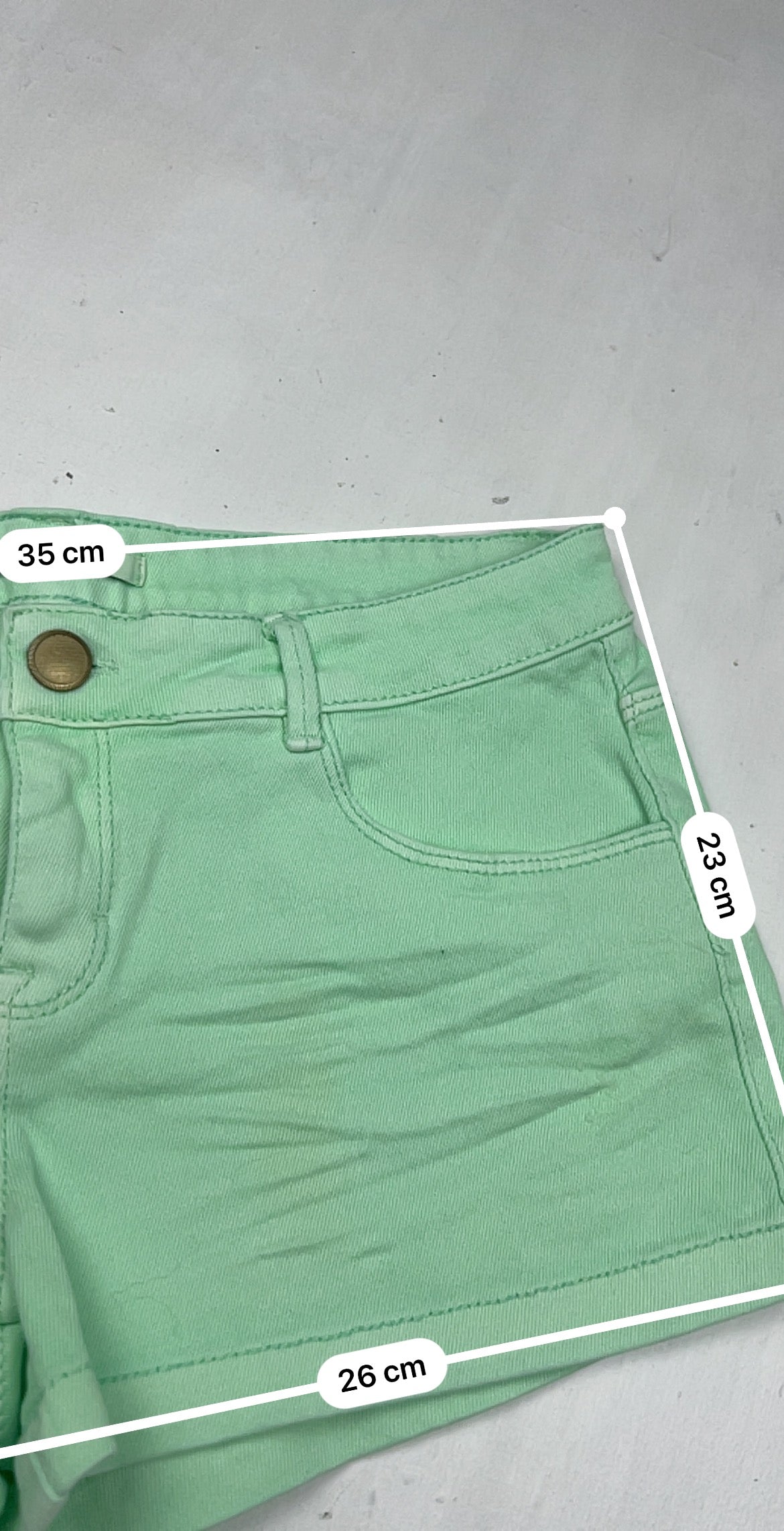 Green denim low rise mini short (S)