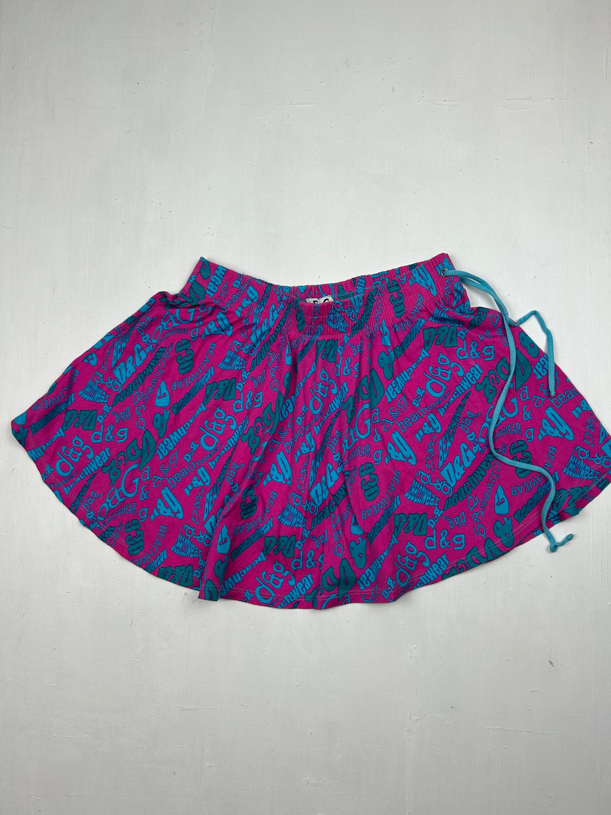 Purple low rise beachwear mini skirt (XS)
