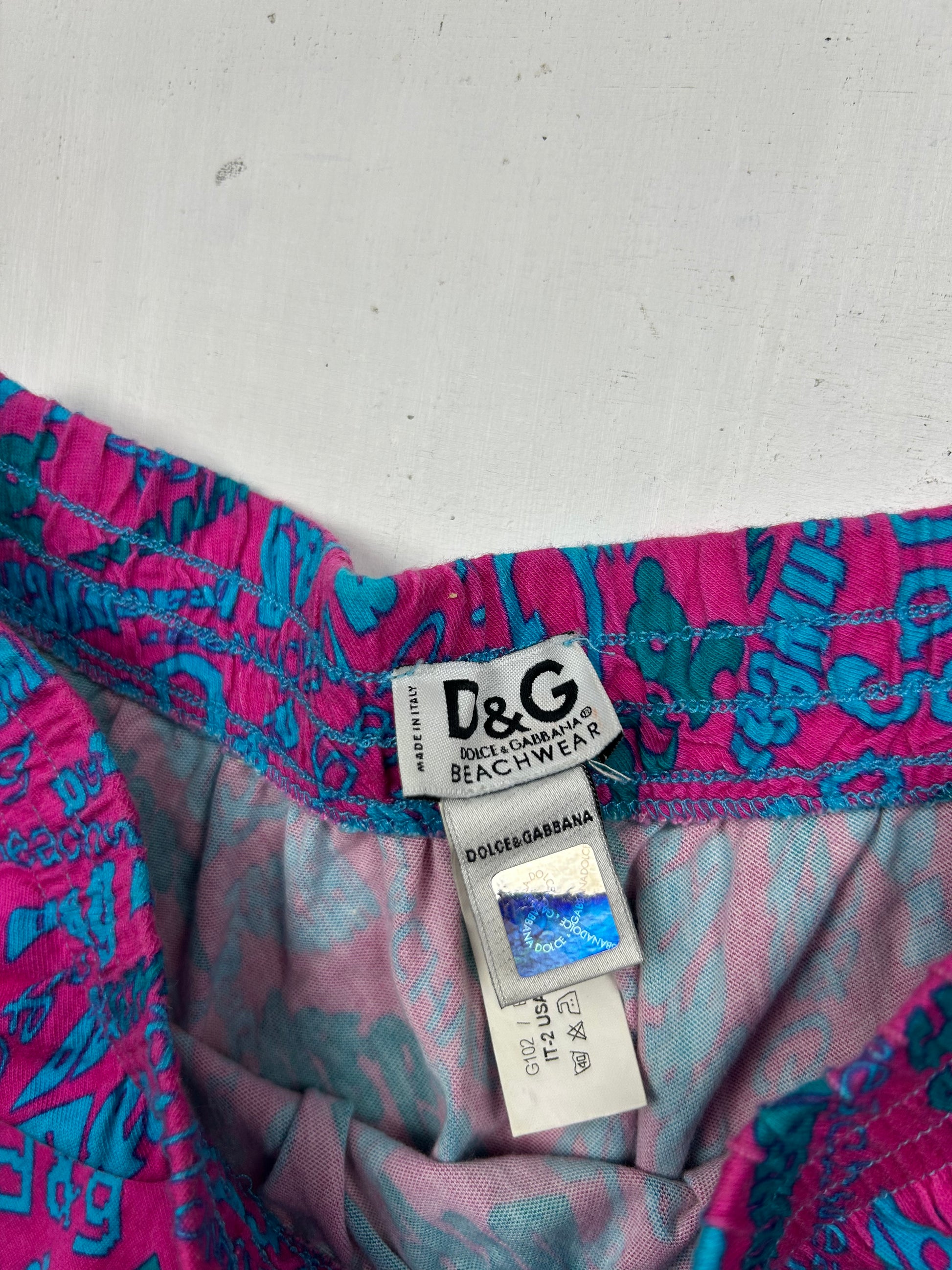 Purple low rise beachwear mini skirt (XS)