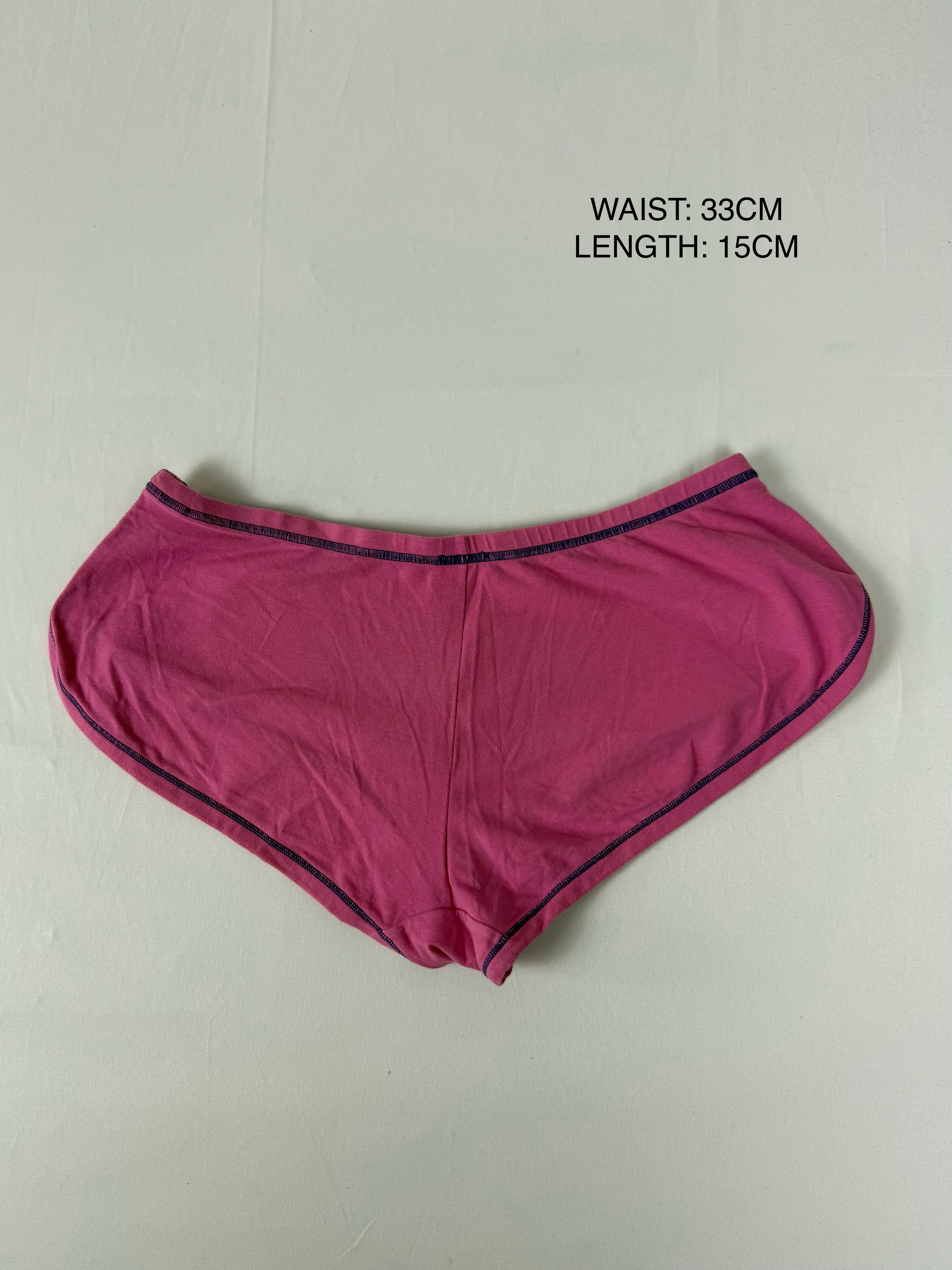 Pink stretchy low rise mini short (S)