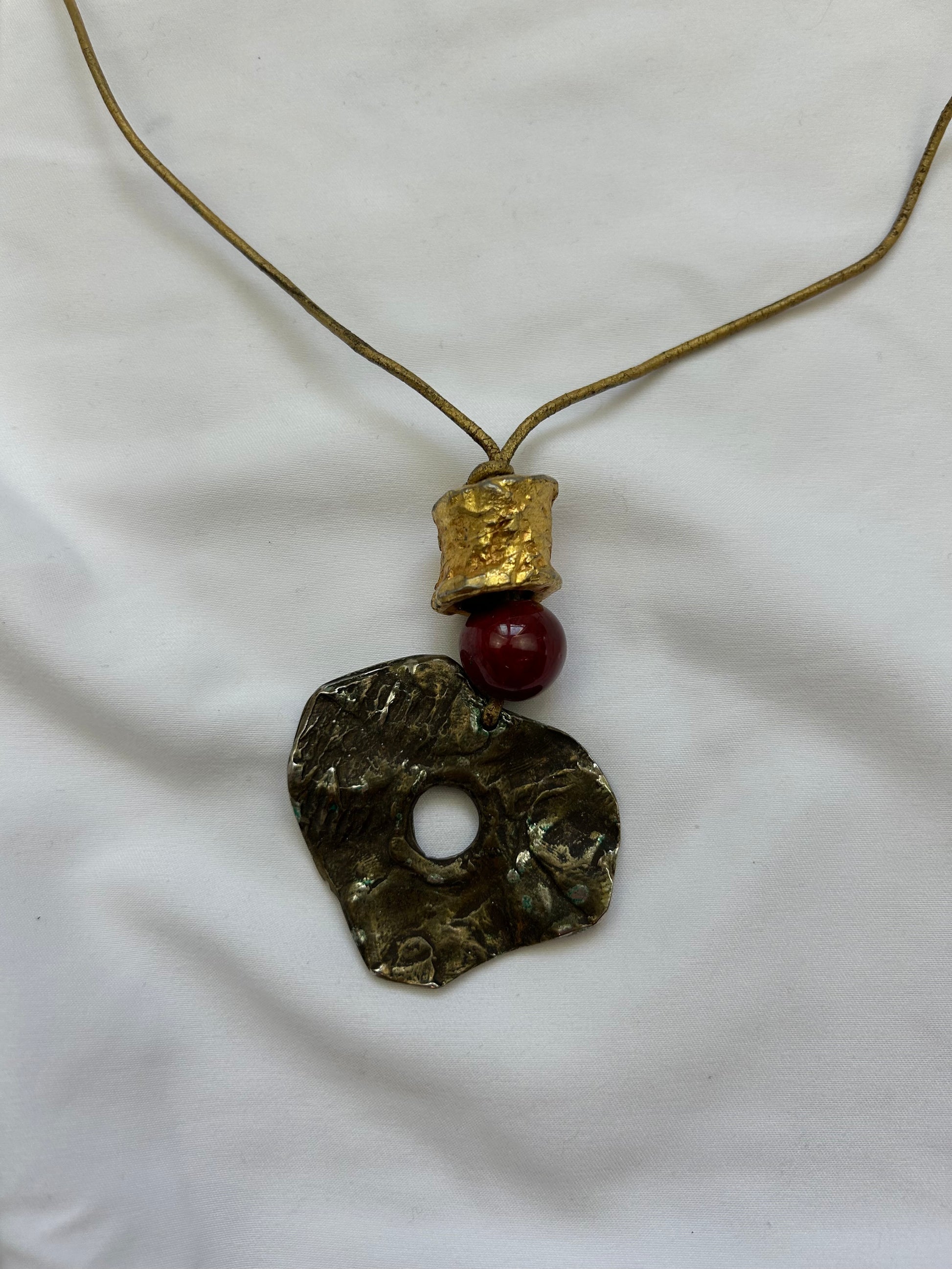 Gold cord pendant necklace