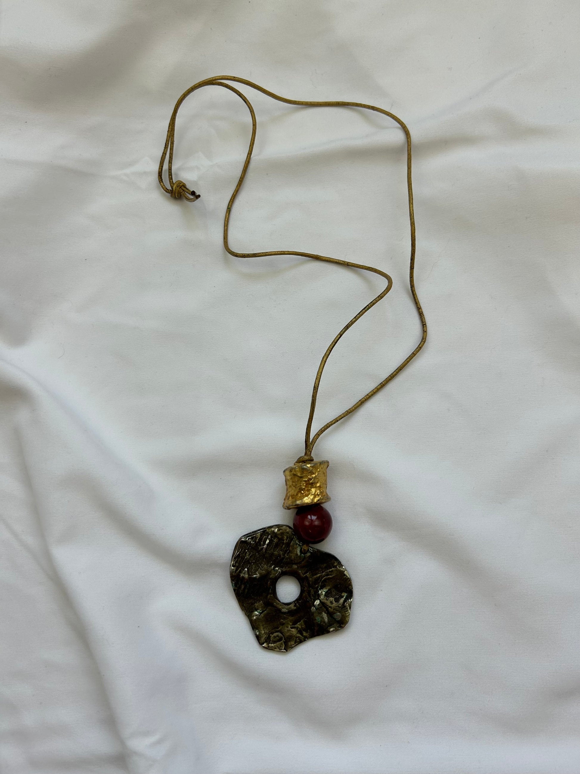 Gold cord pendant necklace