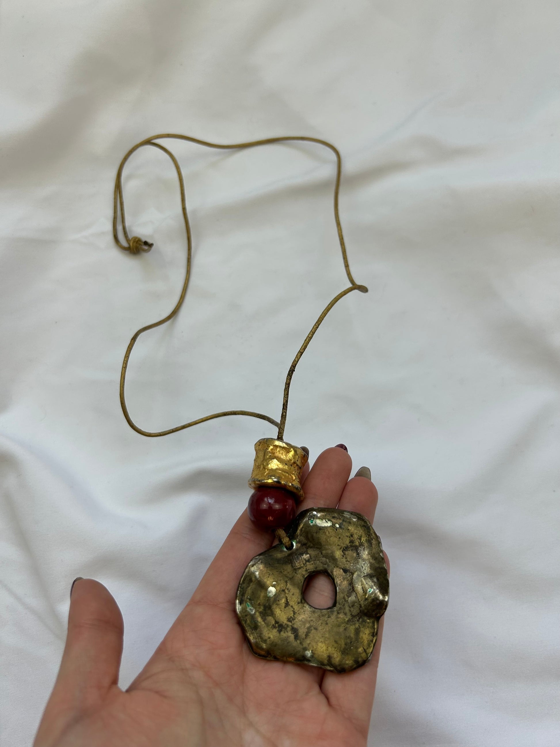 Gold cord pendant necklace