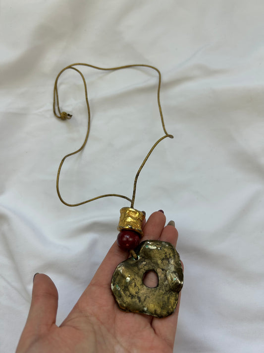 Gold cord pendant necklace