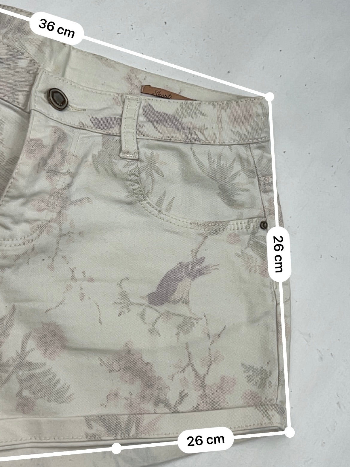 Cream floral denim low rise mini short (S)