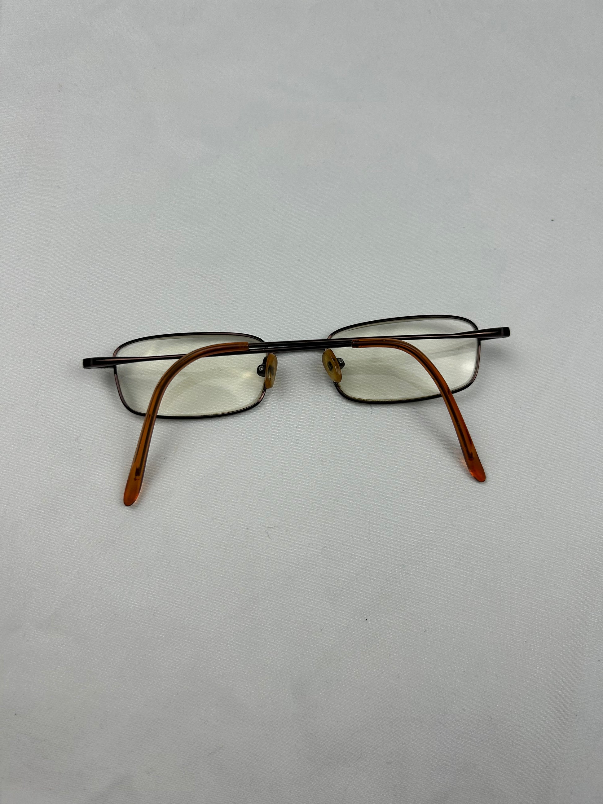 2000s office siren glasses (with prescription)