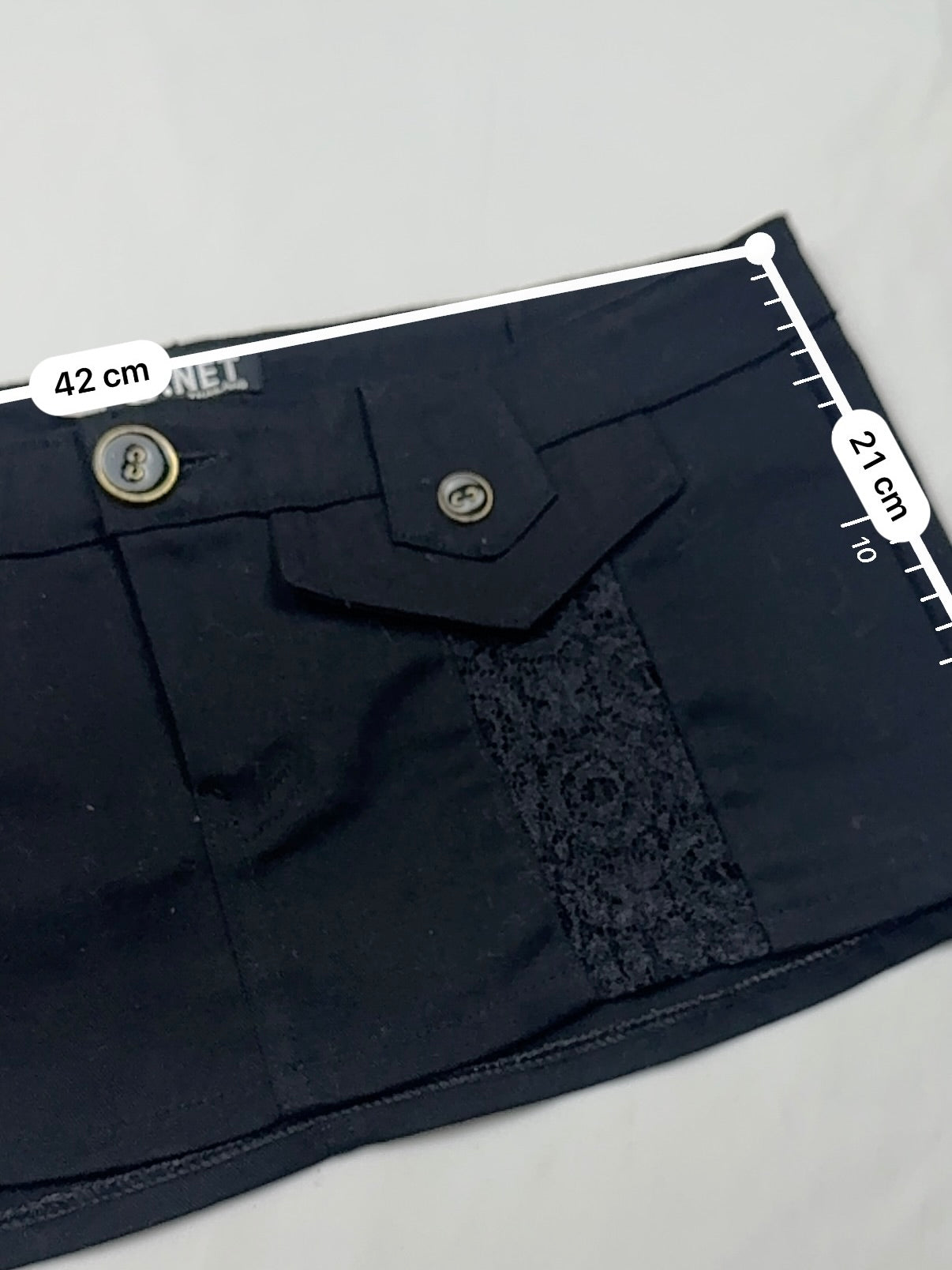 Black low rise mini / micro skirt (M)