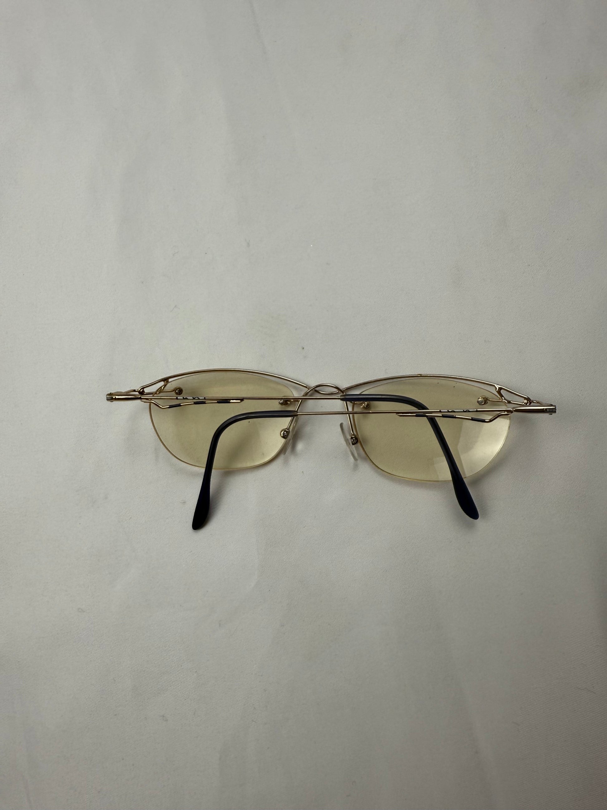 2000s office siren glasses (with prescription)