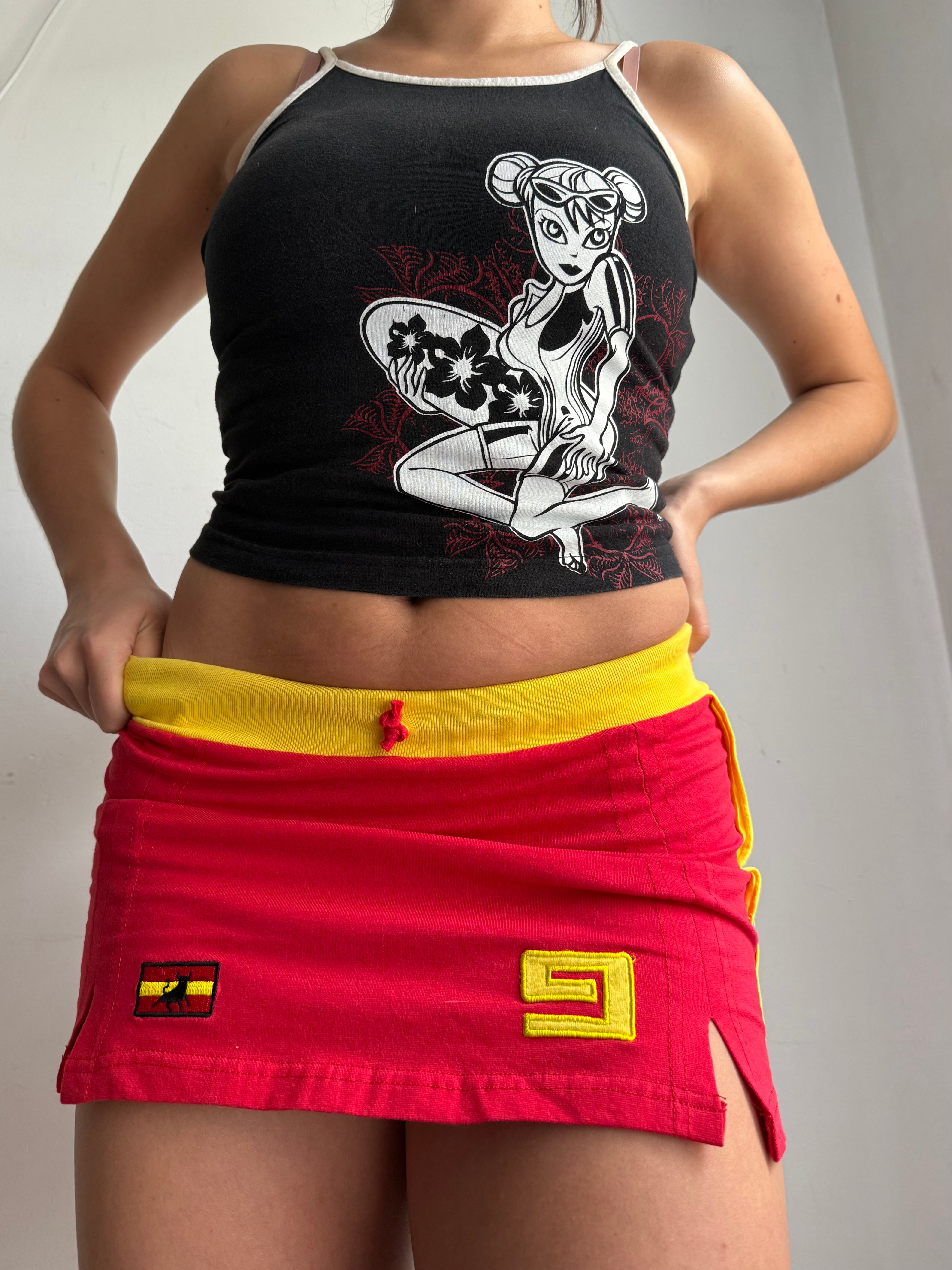 Red activewear spain mini skirt (XS)