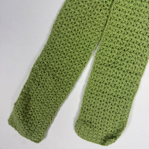 Green knitted winter scarf