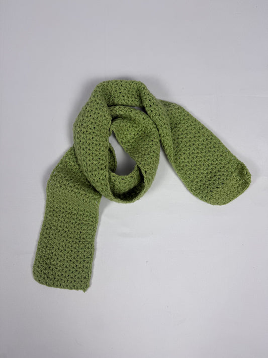 Green knitted winter scarf