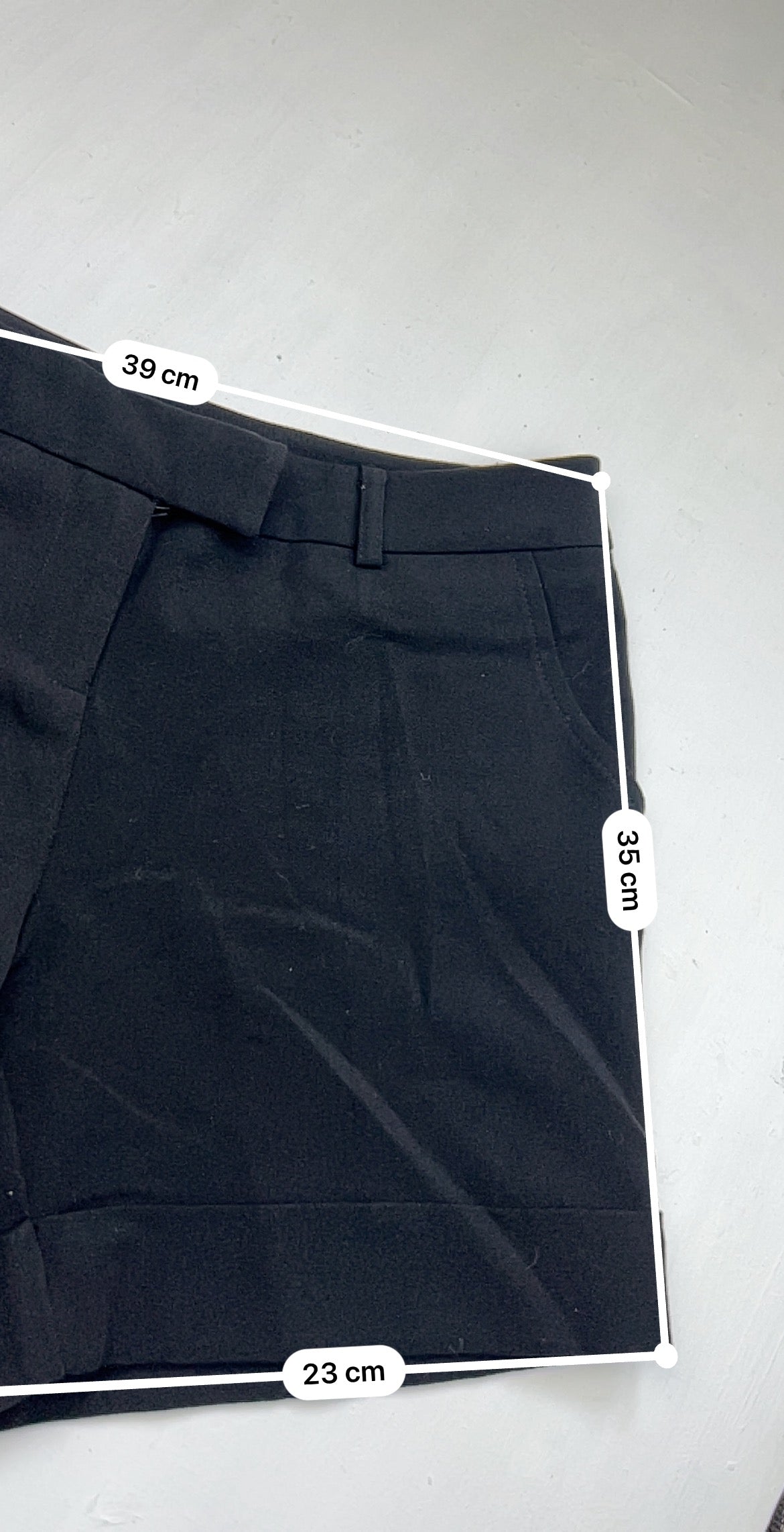 Black low rise office siren mini short (S)