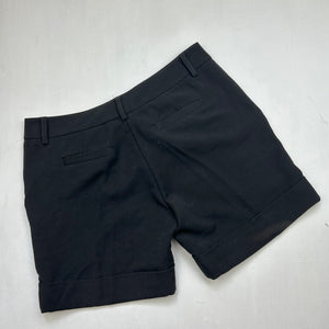 Black low rise office siren mini short (S)