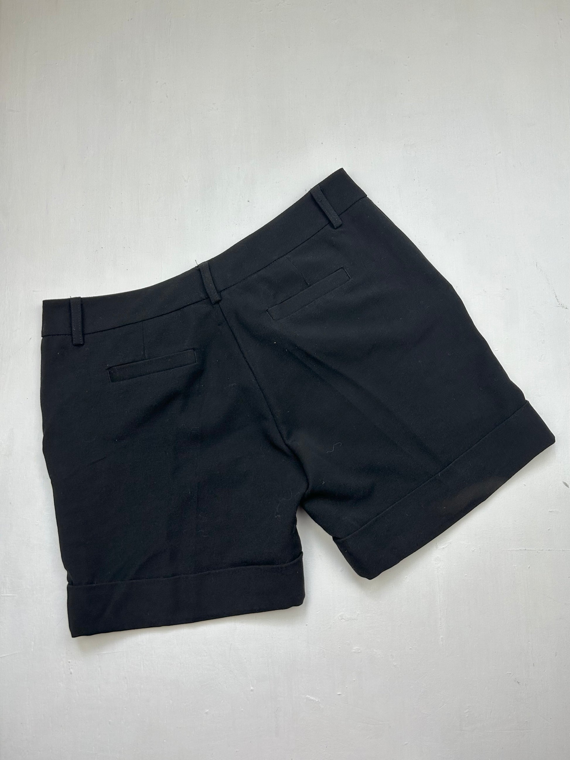 Black low rise office siren mini short (S)