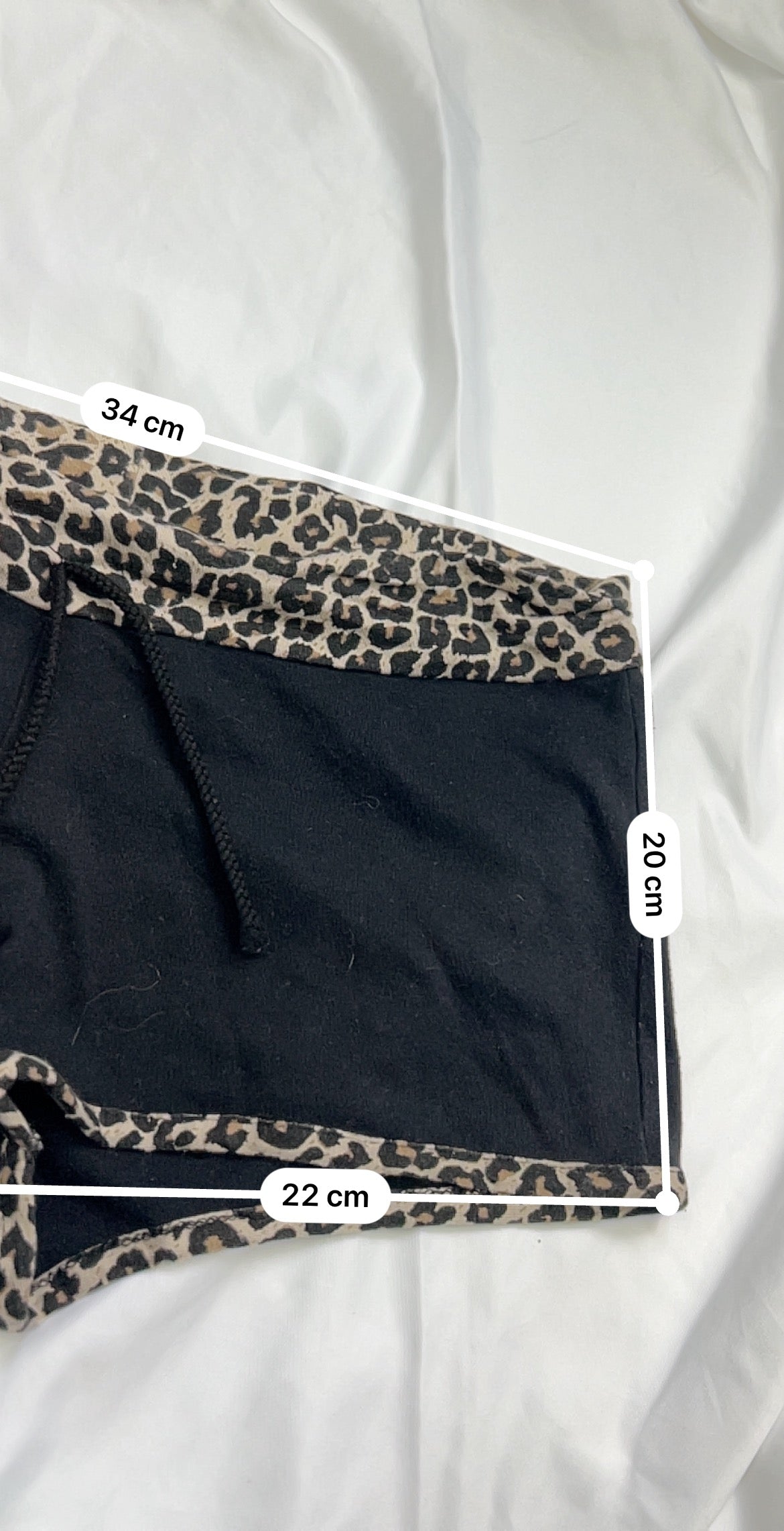 Black low rise panther print sporty mini short (M)