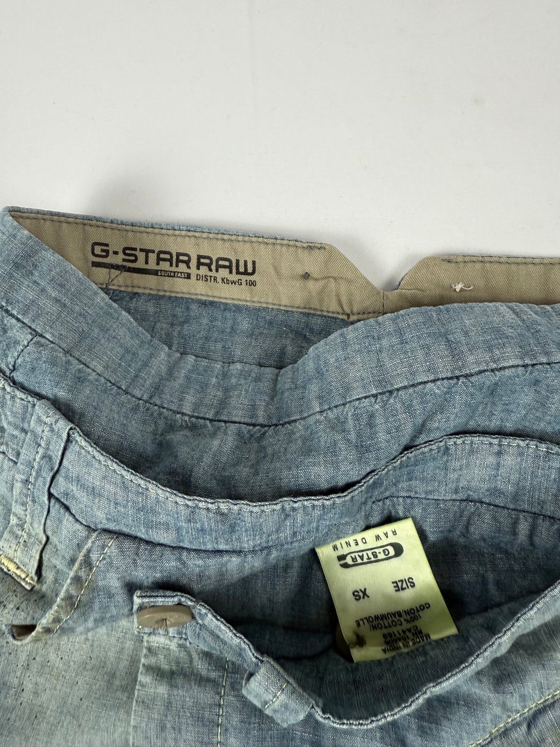 Blue denim low rise mini skirt (XS)